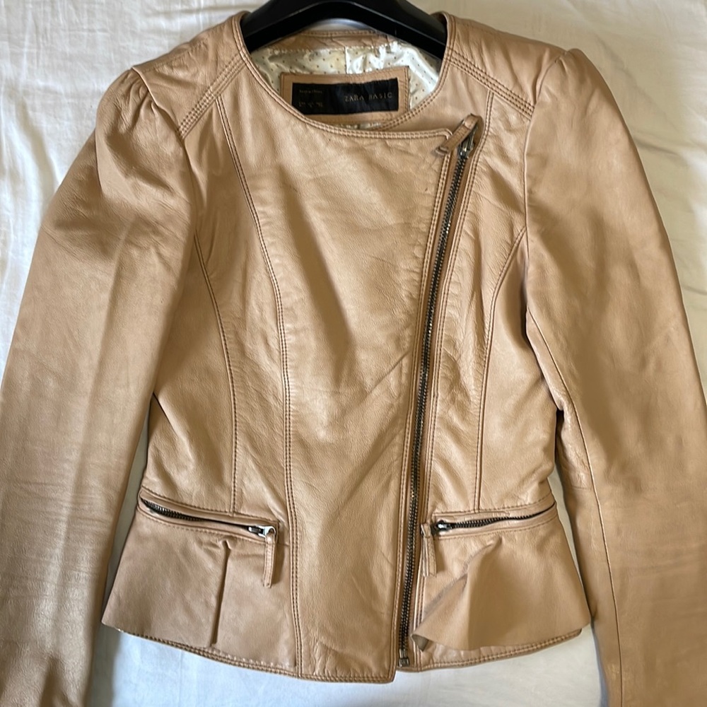 Gently used Zara leather jacket with ruffle detail.